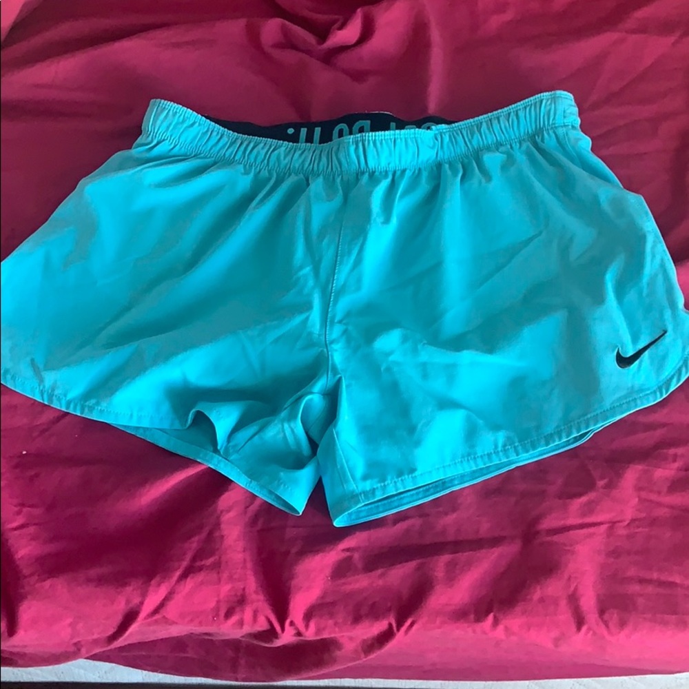 Nike blue shorts with under spandex layer